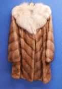 A lady's fur coat by Zwirn, London, the 3/4 length brown fur coat with cream collar and side pockets