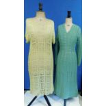 Two mid circa 1970's crochet dresses, one in sage green with long sleeves and V neck; the other in a