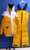 A gentleman's Musto Offshore yellow, white and navy jacket, together with a pair of matching