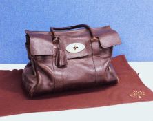 A dark brown Mulberry handbag, approx 38cm wide, with dust bag and certificate