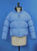 A lady's powder blue original Puffa jacket, waist length, downfilled with zip front, size S
