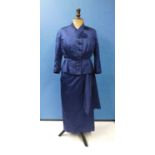 A navy blue satin dress and matching jacket by Hardy Amies, 14 Saville Row, London, W1, the capped