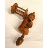A 19th century fruitwood sewing clamp thread winder, approx. 17 x 14cm