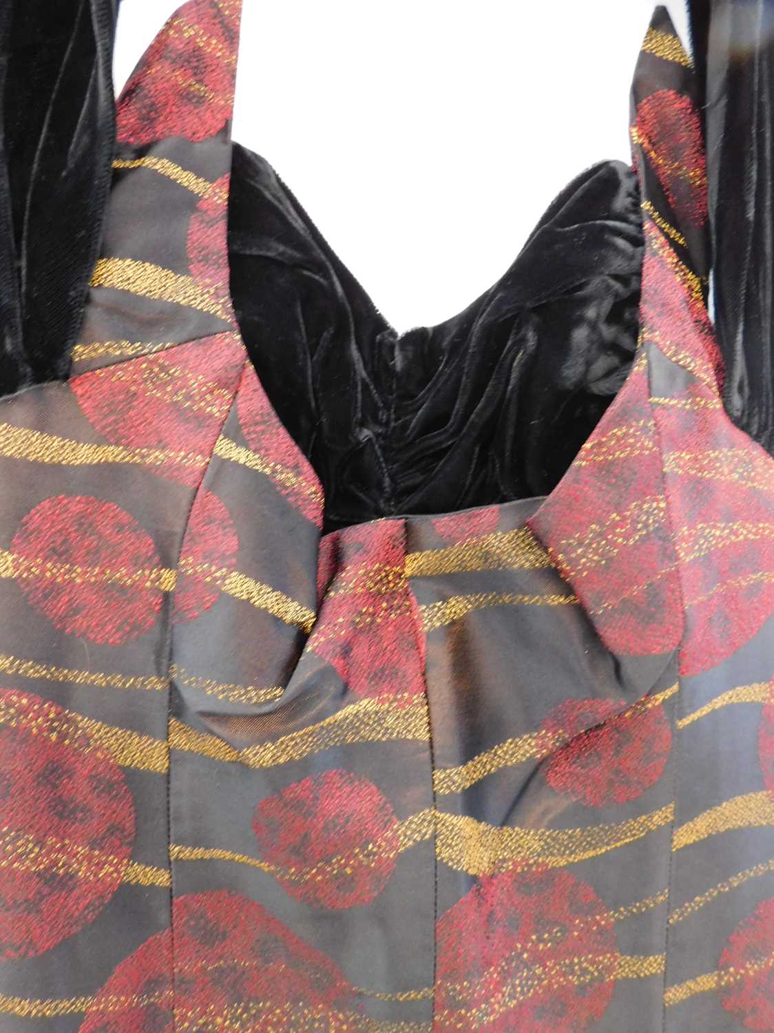 A lady's evening dress by Ricci Michaels of Mayfair, the halterneck dress with black red and gold - Image 2 of 3