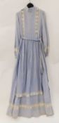 A c.1977 Laura Ashley blue and white cotton dress, with vertical pin tuck and lace trim front, cuffs