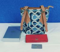 A Vivienne Westwood 'Squiggle bag' and a Vivienne Westwood purse, the bag in blue and cream fabric