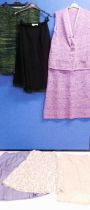 A mixed lot of mid 20th Century separates to include a purple knitted skirt and knitted waistcoat,