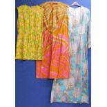 Three circa 1960's/70's lady's dresses to include a blue and white floral full length cotton dress