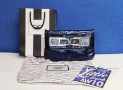 A handbag by Anya Hindmarch, in blue metallic finish mock croc leather with large gilt buckle
