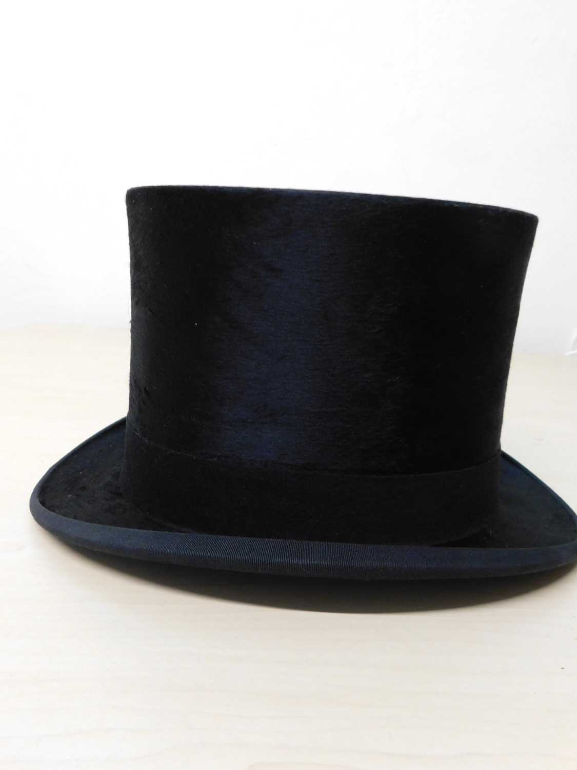 A black silk top hat by Hope Brosthers Ltd., Ludgate Hill, London, inner diameter approx. 55cm, with - Image 7 of 9