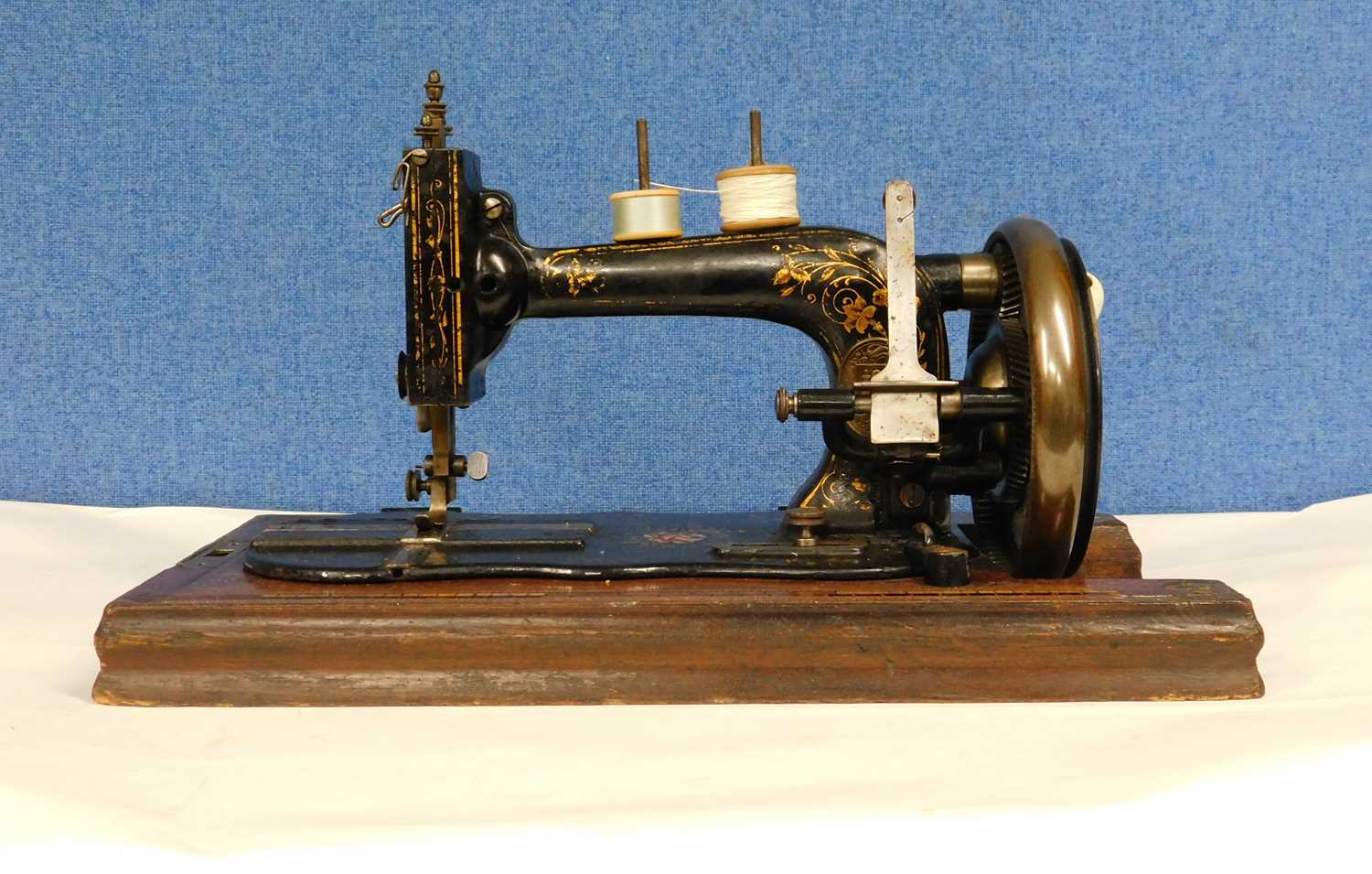 A late 19th century sewing machine, possibly German, with original carry case cover - Image 2 of 7
