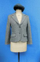 A lady's Harris Tweed jacket, single breasted two button fastening with front flap pockets, size