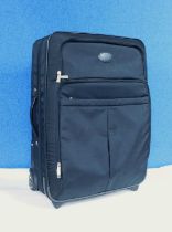 A Mulberry black suitcase with wheels, adjustable compartments, carry handle (a/f) approx 63 x 41