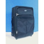 A Mulberry black suitcase with wheels, adjustable compartments, carry handle (a/f) approx 63 x 41