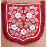 A beaded screen/pennant, the red needlework background with all over beaded flowers and beaded