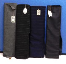 Four bolts of assorted suiting fabric, including from Saville Row tailors, (4)