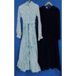 Two Laura Ashley dresses, to include one pale blue and beige floral printed full length dress, circa