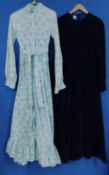 Two Laura Ashley dresses, to include one pale blue and beige floral printed full length dress, circa