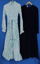 Two Laura Ashley dresses, to include one pale blue and beige floral printed full length dress, circa