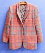 A lady's Harris Tweed jacket, in orange, green and blue check with metal buttons, size 44