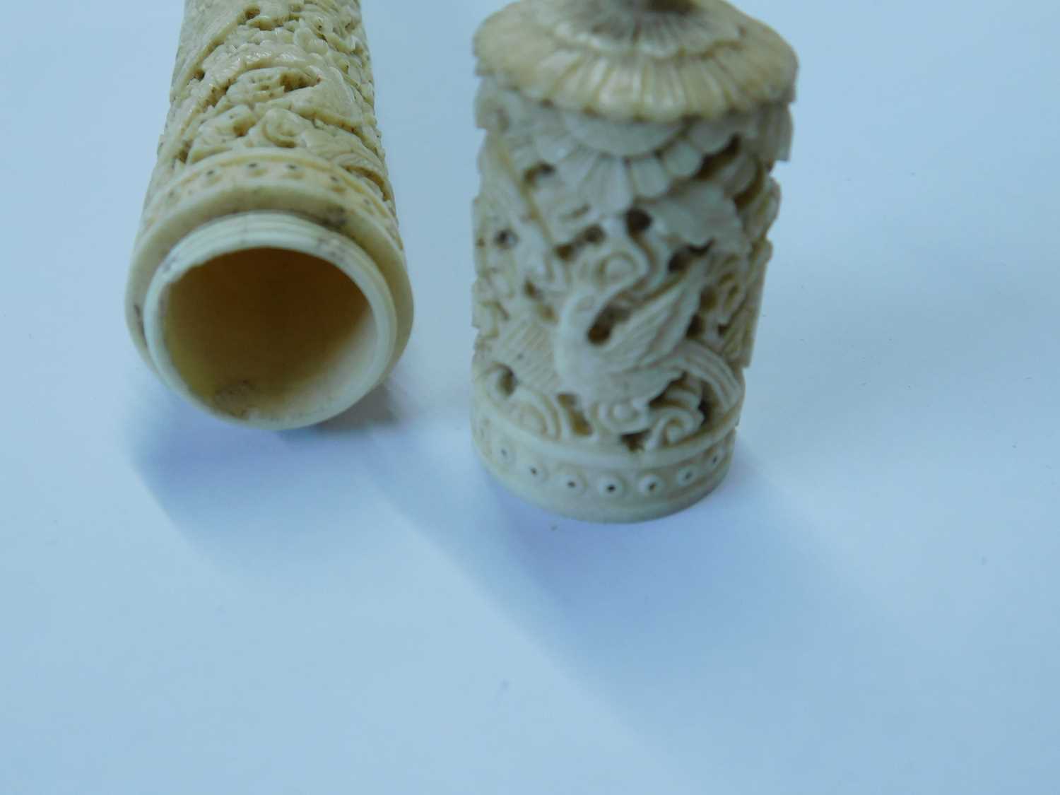 An Eastern carved bone needle case, the round case intricately carved with dragons, birds and - Image 6 of 6
