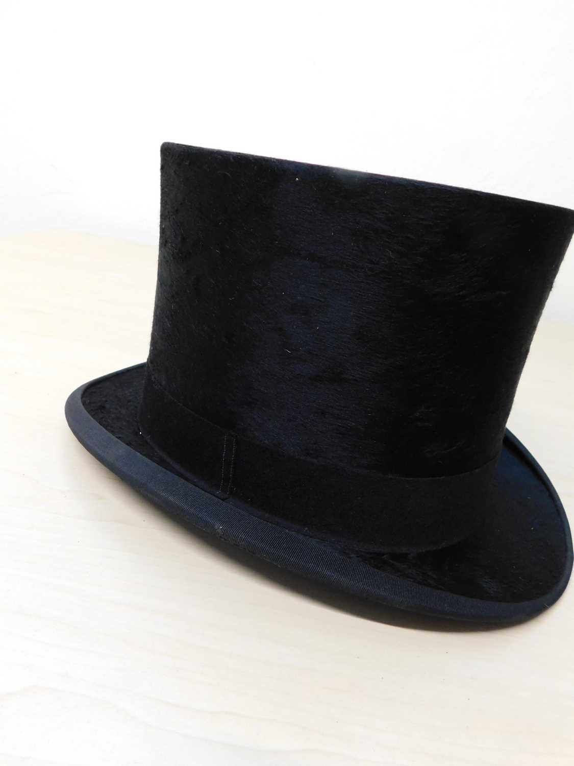 A black silk top hat by Hope Brosthers Ltd., Ludgate Hill, London, inner diameter approx. 55cm, with - Image 6 of 9