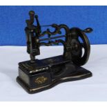 ***PLEASE NOTE AMENDMENT* A late 19th century sewing machine, 'The Globe', P.3115, approx. 36cm wide
