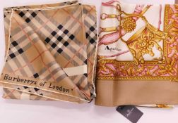 A Burberry and an Aquascutum scarf, the Burberry silk scarf in classic Burberry check with central