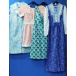 Four mid 20th Century ladies dresses, to include a white and floral patterned long dress with lace