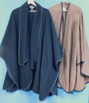 Two lady's capes/wraps to include a brown wool and cashmere mix cape with black trim; together