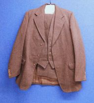 A gentleman's brown wool tweed three piece suit by Davies & Son, Hanover St., London, jacket approx.