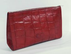A red Mulberry washbag, rectangular with zip top, internal zip pocket, approx. 26cm wide