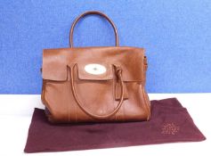 A tan/brown leather Mulberry handbag, serial no. 10444217, approx 36cm wide, with dust bag and
