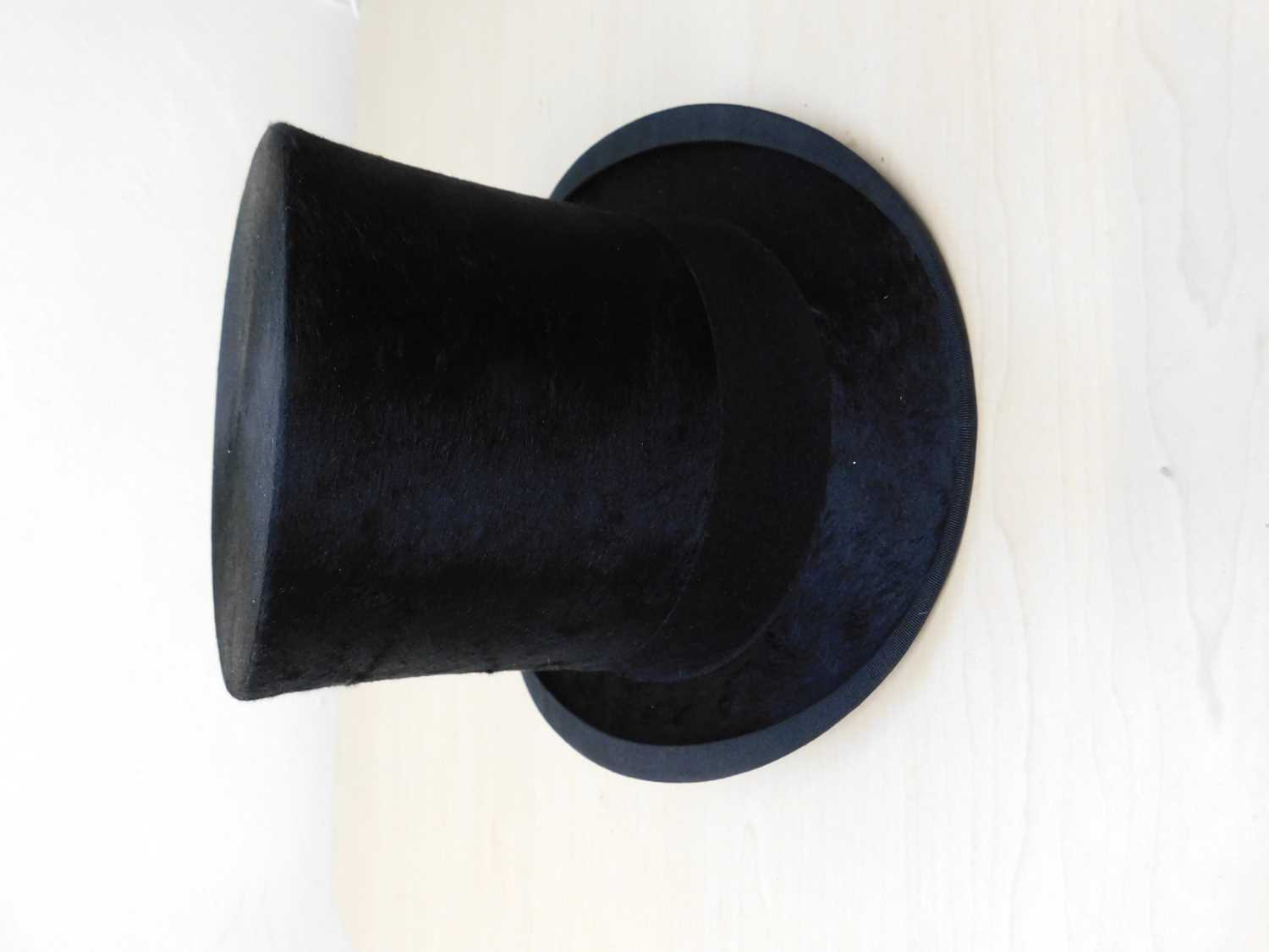 A black silk top hat by Hope Brosthers Ltd., Ludgate Hill, London, inner diameter approx. 55cm, with - Image 9 of 9