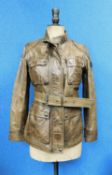 A lady's brown Belstaff Trailmaster Panther waxed leather jacket with zip front and popper
