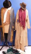 A quantity of mid 20th Century menswear to include two dressing gowns, a waistcoat, scarves, hats