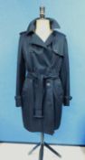 A lady's black Aquascutum trenchcoat, the double breasted coat with belted/tie waist, custom