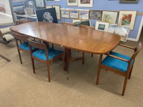 Danish teak oval extending dining table with two additional leaves, manufactured by Gudme, together