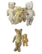 Six vintage teddy bears, assorted sizes.