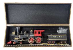 A highly detailed die-cast 0 gauge steam locomotive and tender (marked W & A RR) in black livery