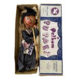 A boxed Pelham SM Witch marionette puppet