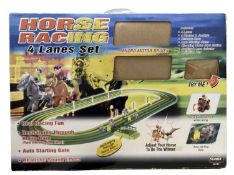 A boxed electronic Horse Racing set by Silverlit (Unchecked for completeness)