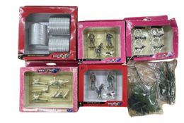A collection of boxed Britains plastic figures and outhouses, to include: - Pig Sheds - Cattle -