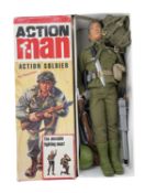 A boxed 1960s reproduction Action Man figure by Palitoy.