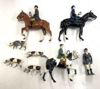A collection of Britains huntsmen and dogs (horses and riders repainted)