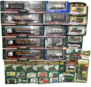 A collection of boxed Eddie Stobart vehicles.