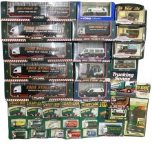 A collection of boxed Eddie Stobart vehicles.