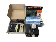 A mixed lot of various model railway controllers, to include: - A boxed Gaugemaster DCC02 (