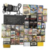 A 1980s Sinclair ZX Spectrum+, together with manuals and a large quantity of assorted games