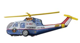 A tinplate Super Flying Police Helicopter by TPS (Japan)